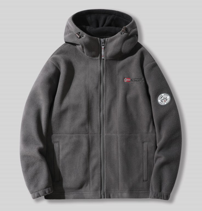 ARCTICGUARD™ DOUBLE-LAYER THERMAL DESIGN + WINDPROOF OUTER SHELL + SHERPA INNER