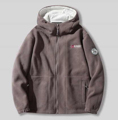 ARCTICGUARD™ DOUBLE-LAYER THERMAL DESIGN + WINDPROOF OUTER SHELL + SHERPA INNER